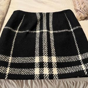 Get a great deal on a like new authentic Burberry plaid wool skirt.